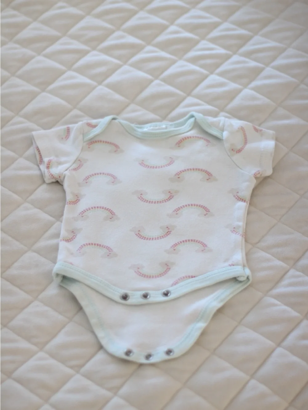 White Baby Onesie with Pink Rainbow Print